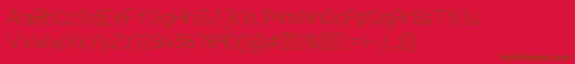 Czcionka Adrianfontv4 – brązowe czcionki na czerwonym tle