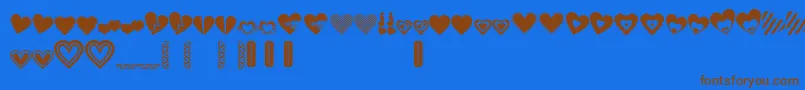 Fonte LovesDevine – fontes marrons em um fundo azul