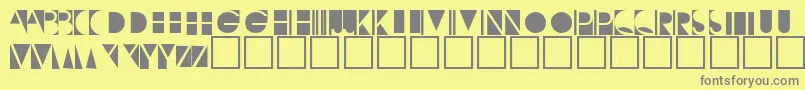 フォントNegativeo – 黄色の背景に灰色の文字