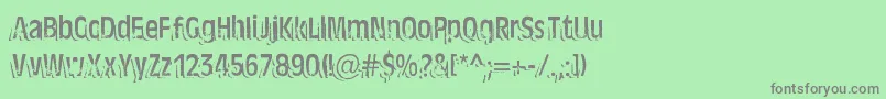 TenTonBallyhoo-Schriftart – Graue Schriften auf grünem Hintergrund