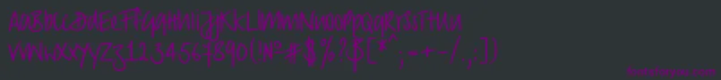 フォントStrongscript – 黒い背景に紫のフォント