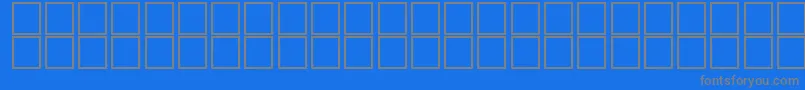 フォントJaridahItalic – 青い背景に灰色の文字