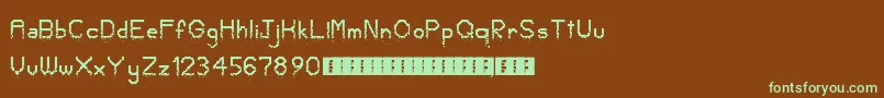 CrumbledPixels Font – Green Fonts on Brown Background