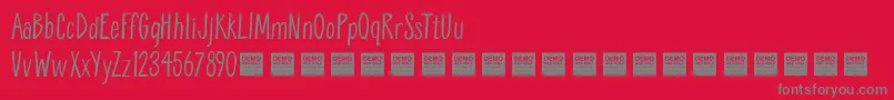 BreatheEasyDemo-Schriftart – Graue Schriften auf rotem Hintergrund