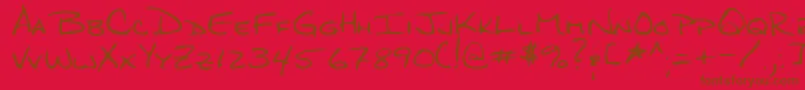 QuigleyRegular Font – Brown Fonts on Red Background