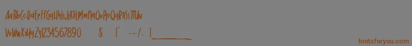 DancingMarker Font – Brown Fonts on Gray Background