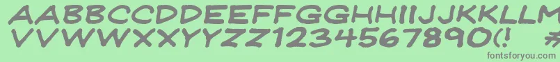 Fonte Jeffreyprintwideitalic – fontes cinzas em um fundo verde