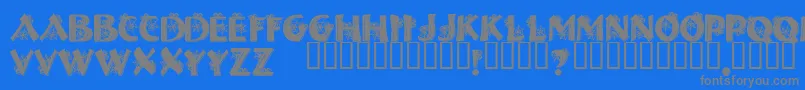 フォントHalloweenSpider – 青い背景に灰色の文字