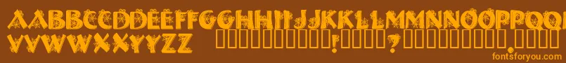 フォントHalloweenSpider – オレンジ色の文字が茶色の背景にあります。