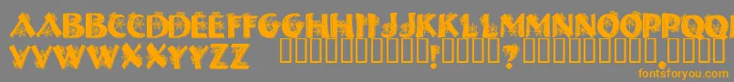 フォントHalloweenSpider – オレンジの文字は灰色の背景にあります。