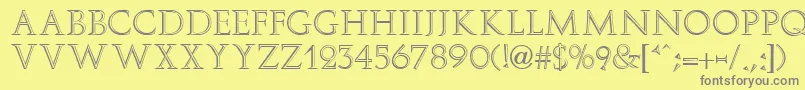 フォントElizaFaciaRegular – 黄色の背景に灰色の文字