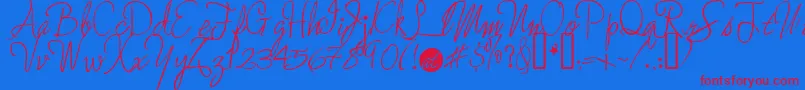 MoreEnchantedPrairieDog Font – Red Fonts on Blue Background