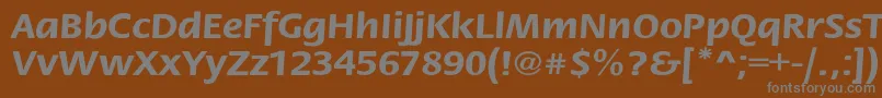 StackextBold-fontti – harmaat kirjasimet ruskealla taustalla