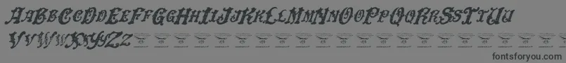 DinglehuckleberryItalic-Schriftart – Schwarze Schriften auf grauem Hintergrund