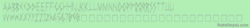 Slasha Font – Gray Fonts on Green Background