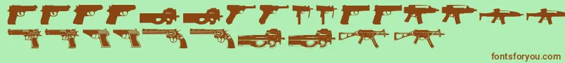 Guns2-Schriftart – Braune Schriften auf grünem Hintergrund