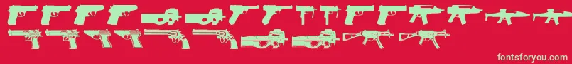 Guns2-Schriftart – Grüne Schriften auf rotem Hintergrund