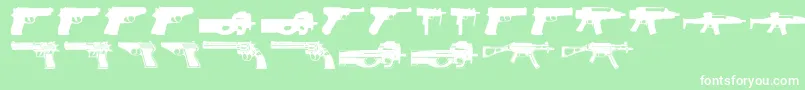 Guns2-Schriftart – Weiße Schriften auf grünem Hintergrund