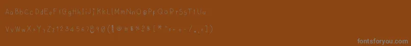 Czcionka Lyemuelookkreung2 – szare czcionki na brązowym tle