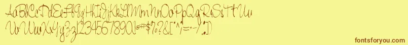 Шрифт Handwriting53Regular – коричневые шрифты на жёлтом фоне