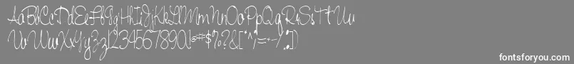 Czcionka Handwriting53Regular – białe czcionki na szarym tle