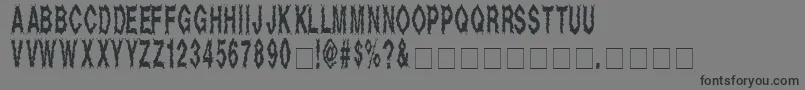 Deada-Schriftart – Schwarze Schriften auf grauem Hintergrund