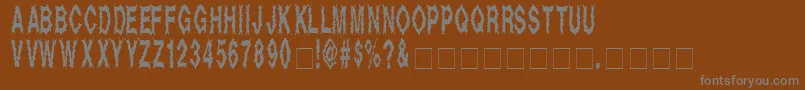 Czcionka Deada – szare czcionki na brązowym tle