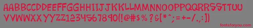 フォントK26loremipsum – 赤い文字の灰色の背景
