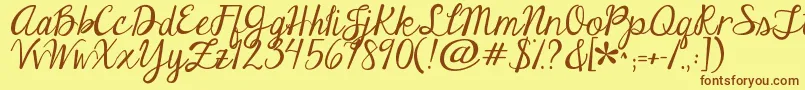 Jandaeleganthandwriting Font – Brown Fonts on Yellow Background