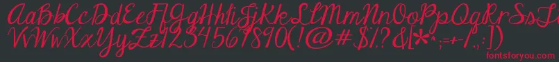 Jandaeleganthandwriting Font – Red Fonts on Black Background