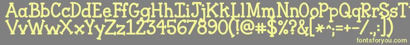 Jandaclosertofree Font – Yellow Fonts on Gray Background