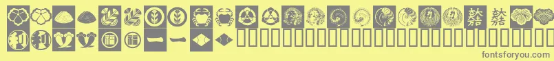 OrientPatternDingsSet2-fontti – harmaat kirjasimet keltaisella taustalla