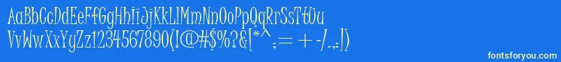 JuiceItcTt-Schriftart – Gelbe Schriften auf blauem Hintergrund