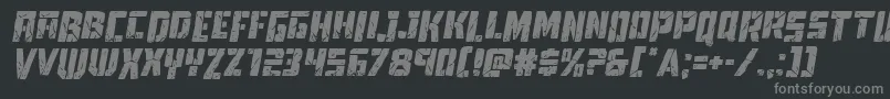 Towerruinsdropital-fontti – harmaat kirjasimet mustalla taustalla