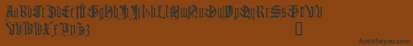 Monugd Font – Black Fonts on Brown Background