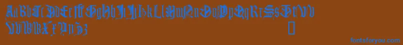 フォントMonugd – 茶色の背景に青い文字