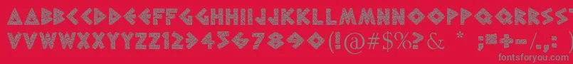 フォントGreekToMe – 赤い背景に灰色の文字