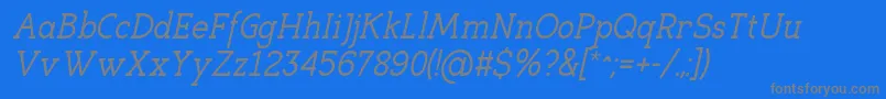 EligibleItalic-fontti – harmaat kirjasimet sinisellä taustalla