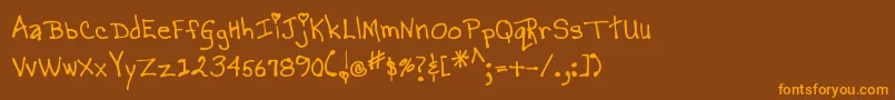 MtfMagicalMarilyn Font – Orange Fonts on Brown Background