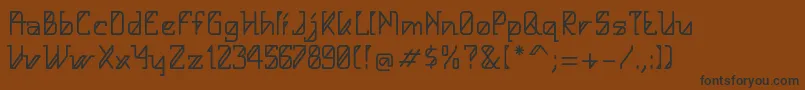 フォントHelloAlpha – 黒い文字が茶色の背景にあります