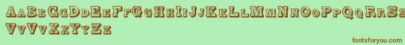 AlphabetFantasie-fontti – ruskeat fontit vihreällä taustalla