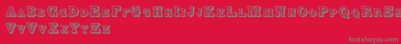AlphabetFantasie Font – Gray Fonts on Red Background