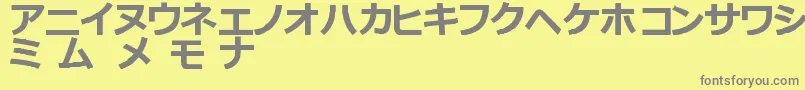 フォントKatakanaTfb – 黄色の背景に灰色の文字