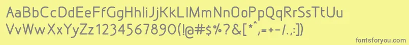 DesignioMedium Font – Gray Fonts on Yellow Background