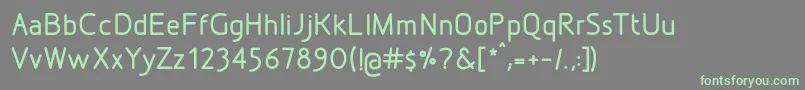 DesignioMedium-fontti – vihreät fontit harmaalla taustalla