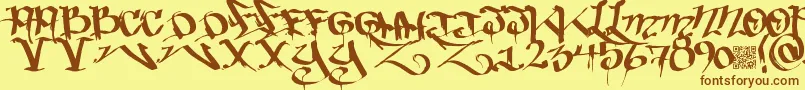 Bakedtrains-Schriftart – Braune Schriften auf gelbem Hintergrund