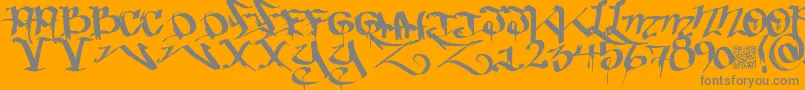 Bakedtrains-Schriftart – Graue Schriften auf orangefarbenem Hintergrund