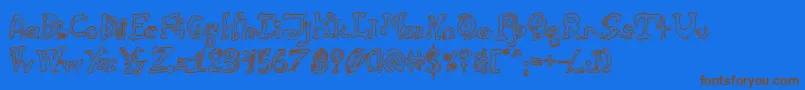CathzuluHollow-Schriftart – Braune Schriften auf blauem Hintergrund
