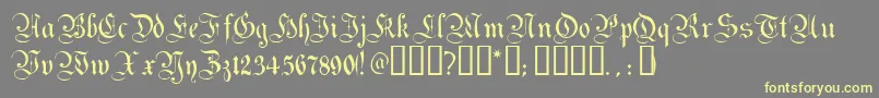 MagdeburgTM Font – Yellow Fonts on Gray Background