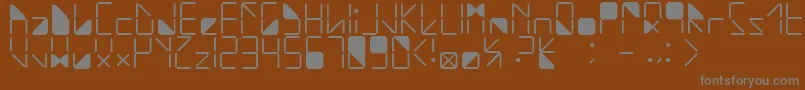 WaterInMyCasio-Schriftart – Graue Schriften auf braunem Hintergrund